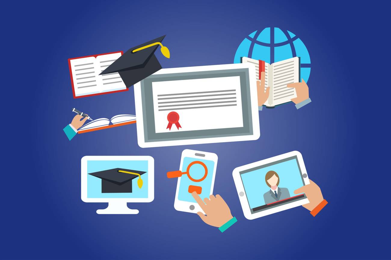 cartoon image of graduation caps and computers