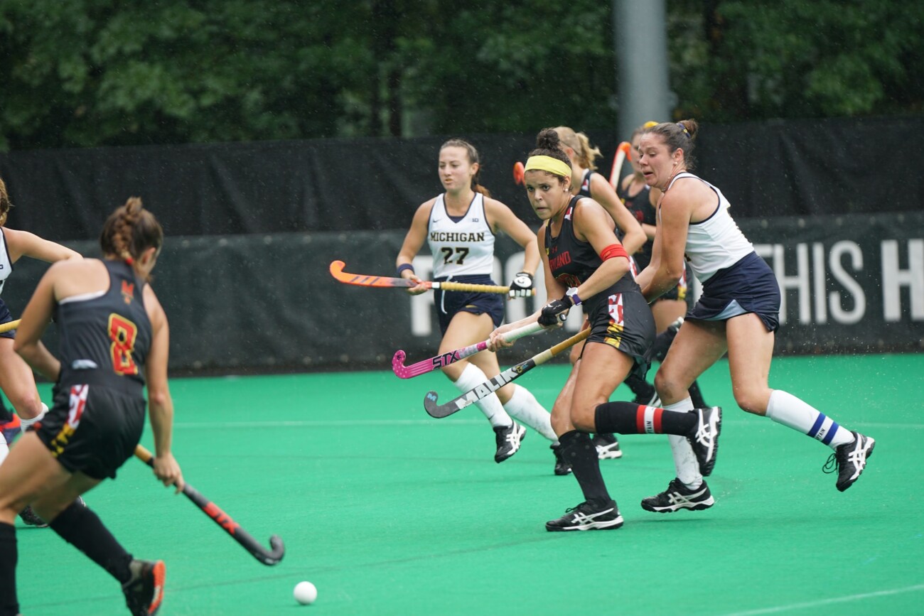 sports team of girls playing hockey