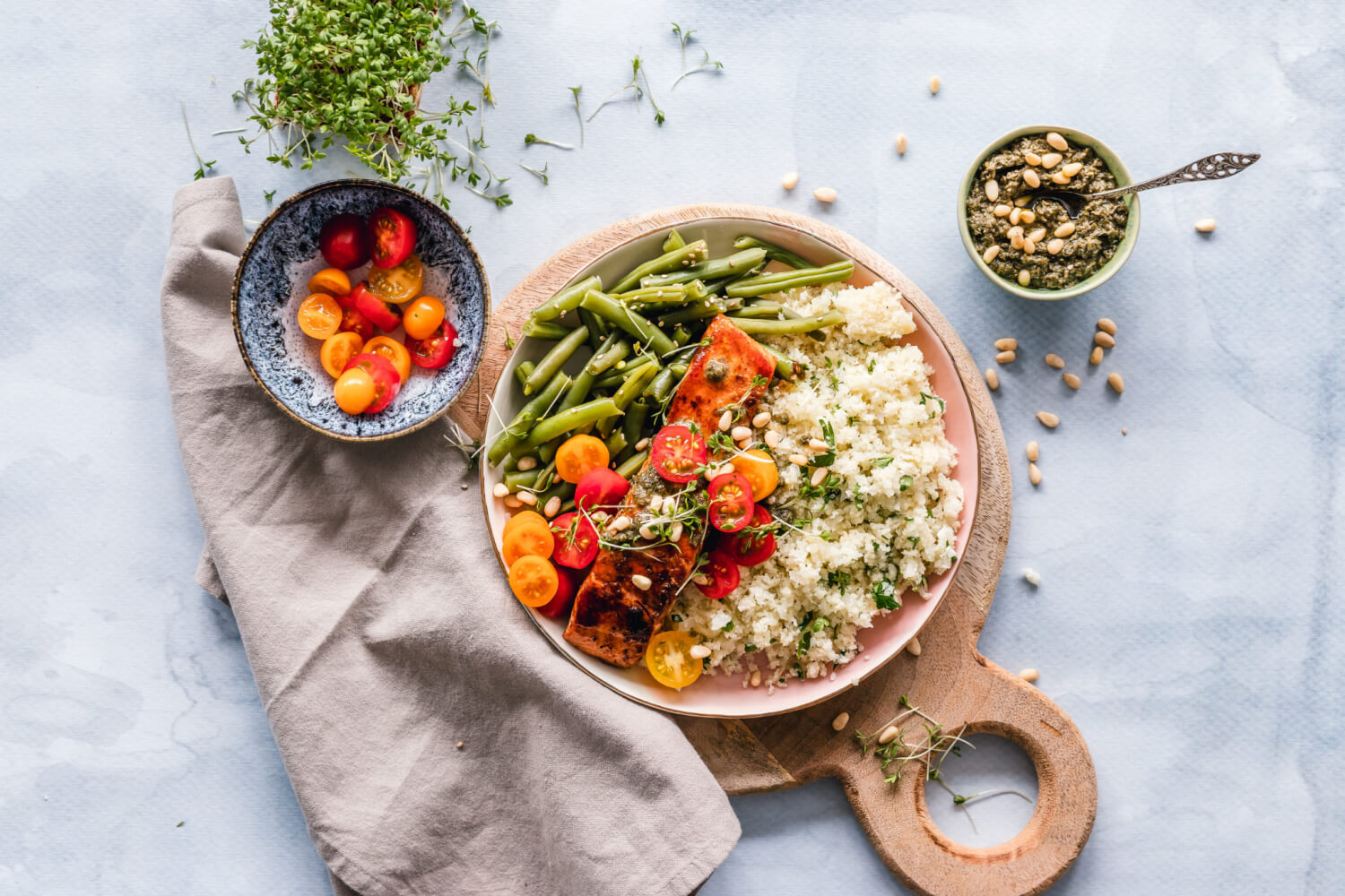 salmon, veg and rice on plates