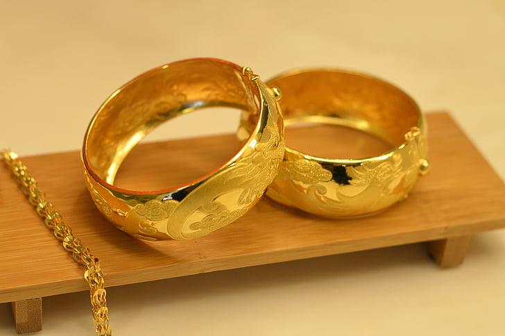 two gold wedding bands