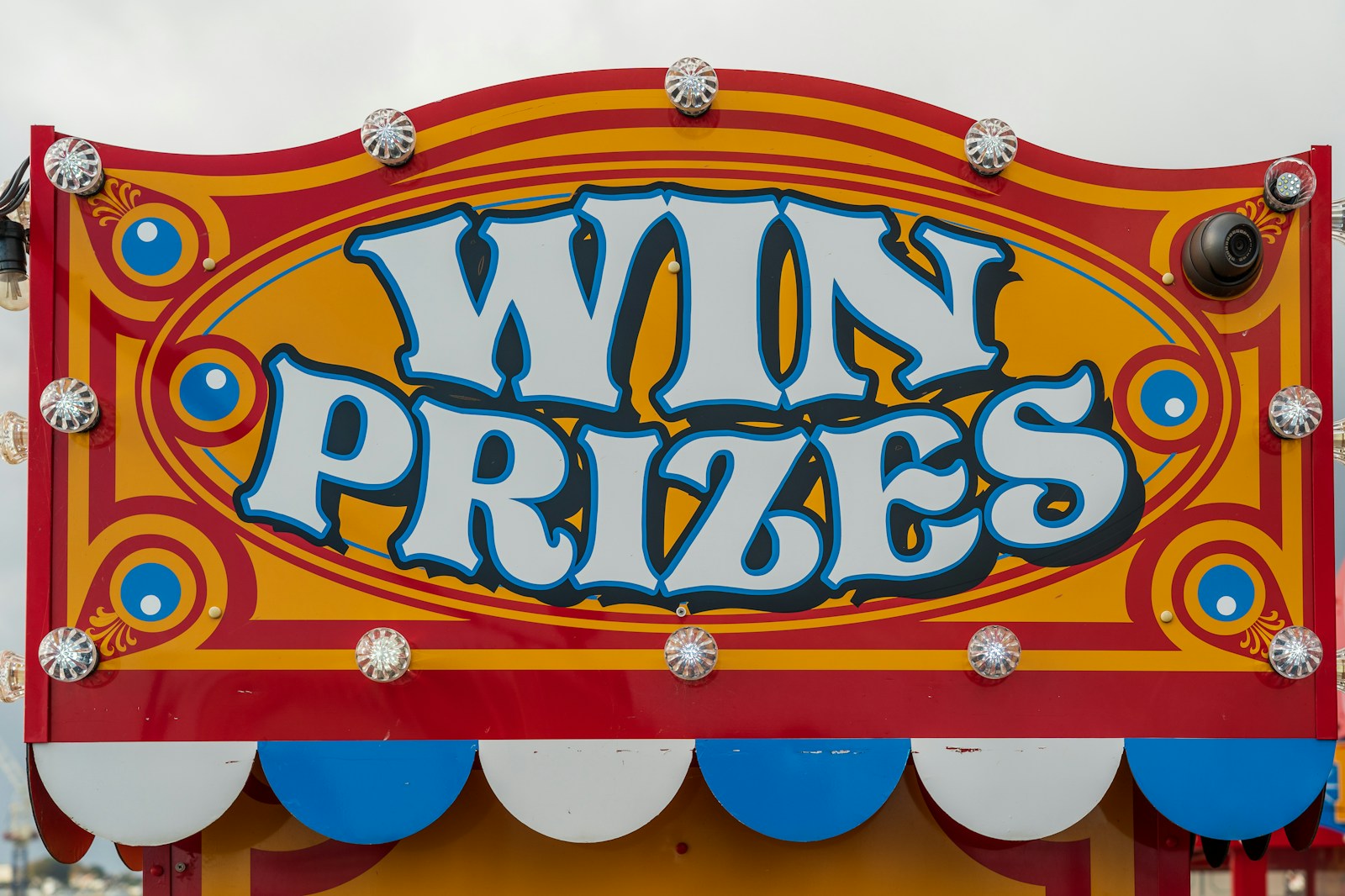 red and gold win prizes signage for fair