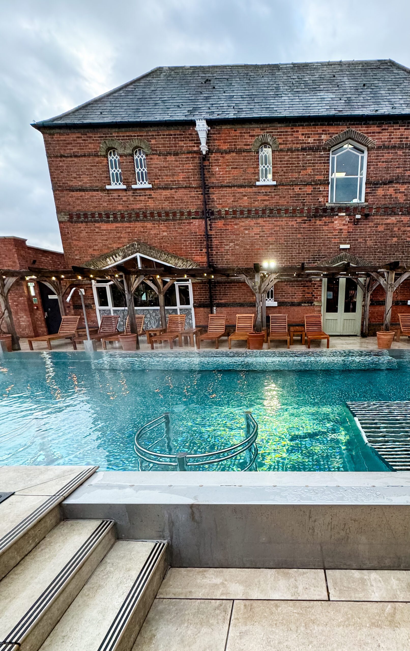 outdoor pool next to building