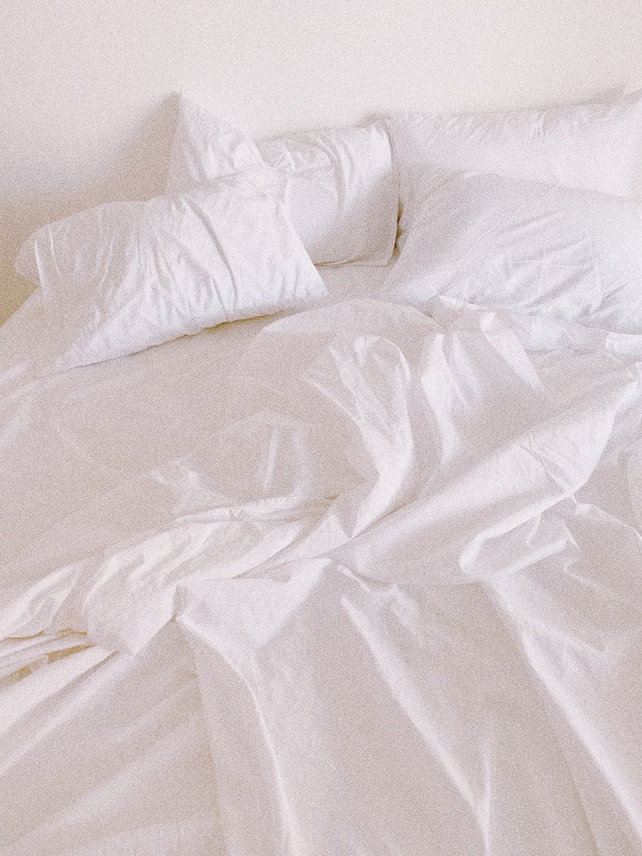 white pillow and duvet on bed
