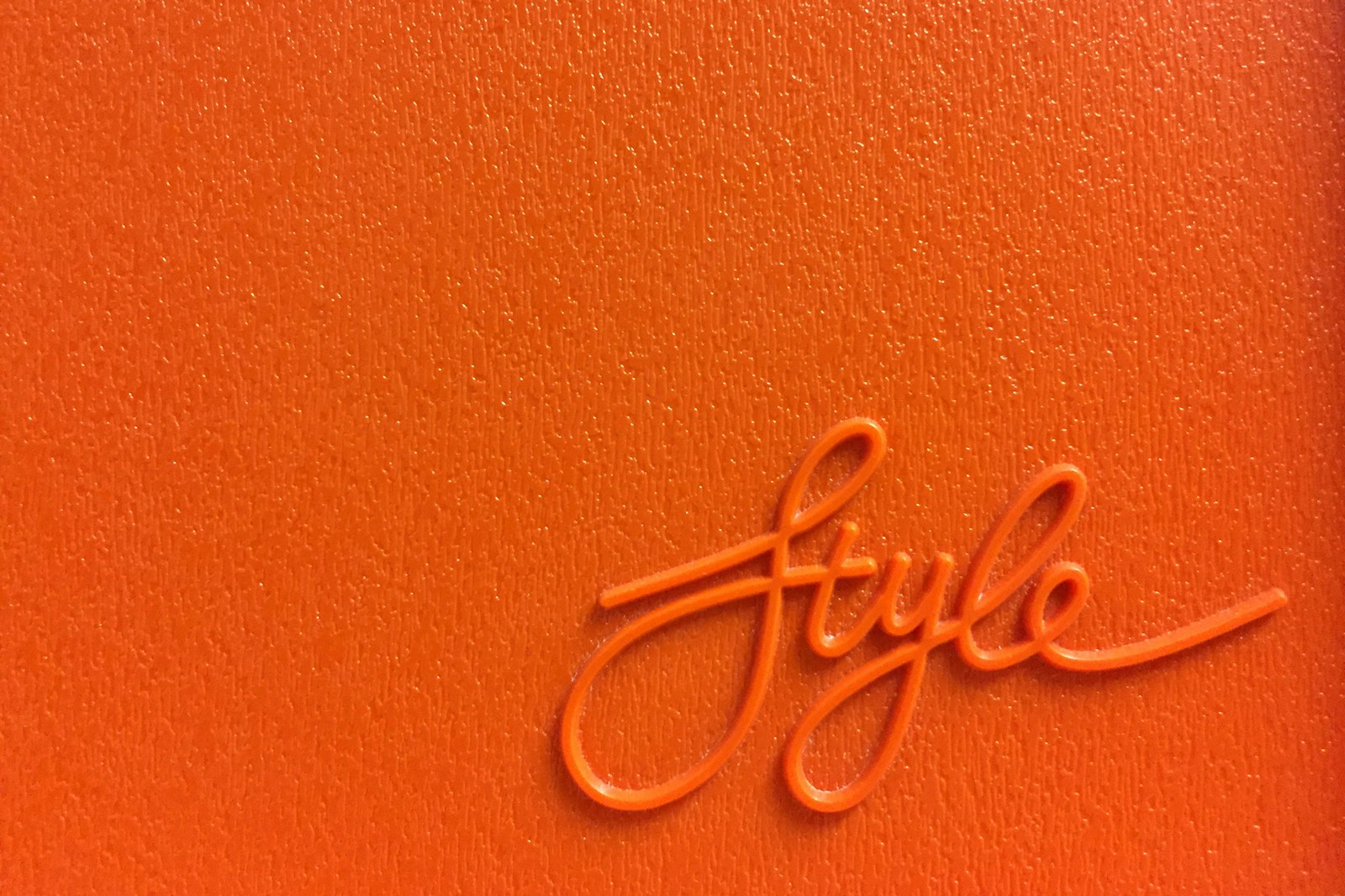 the word 'style' in orange background