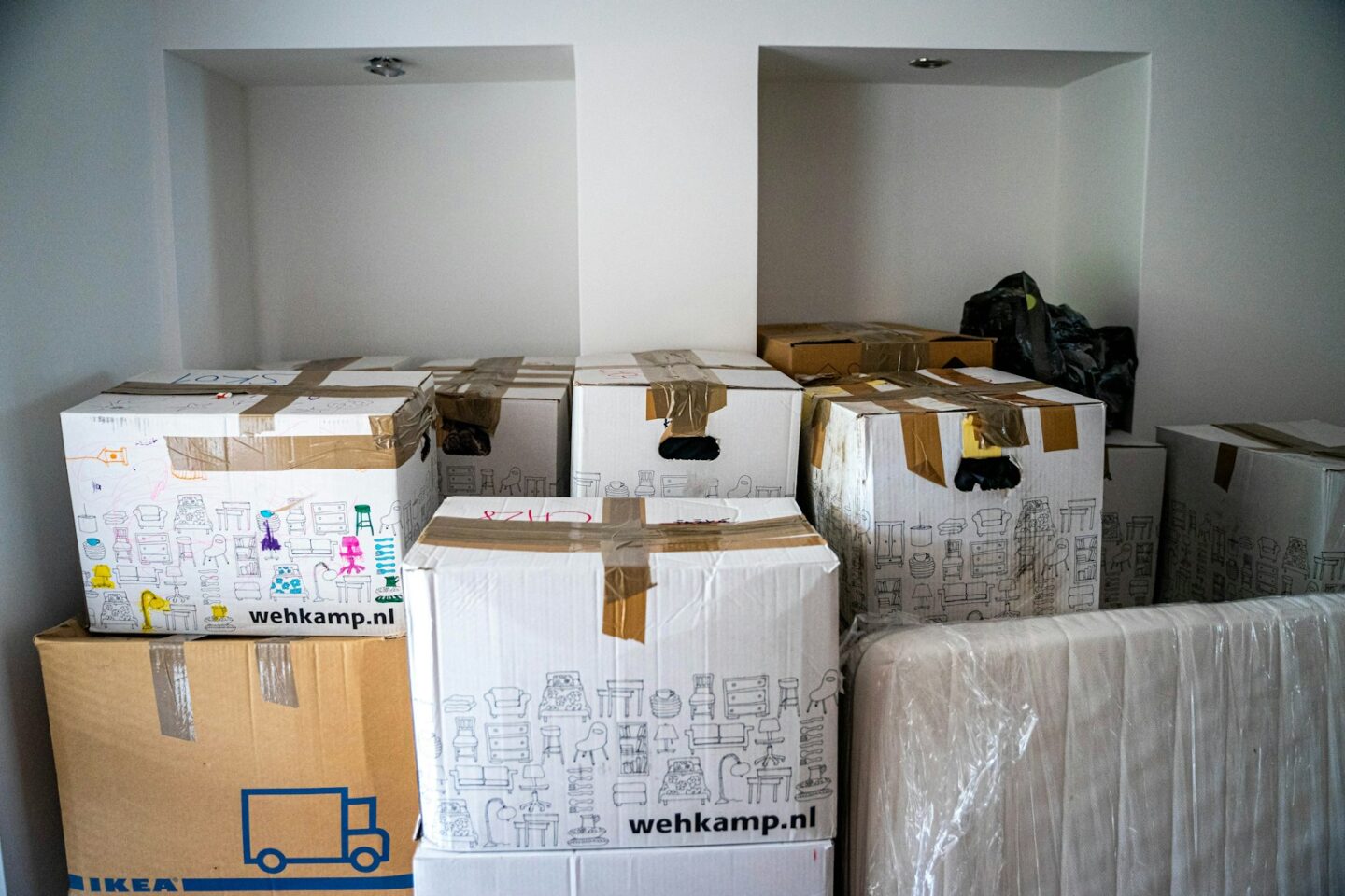 brown and white cardboard boxes 