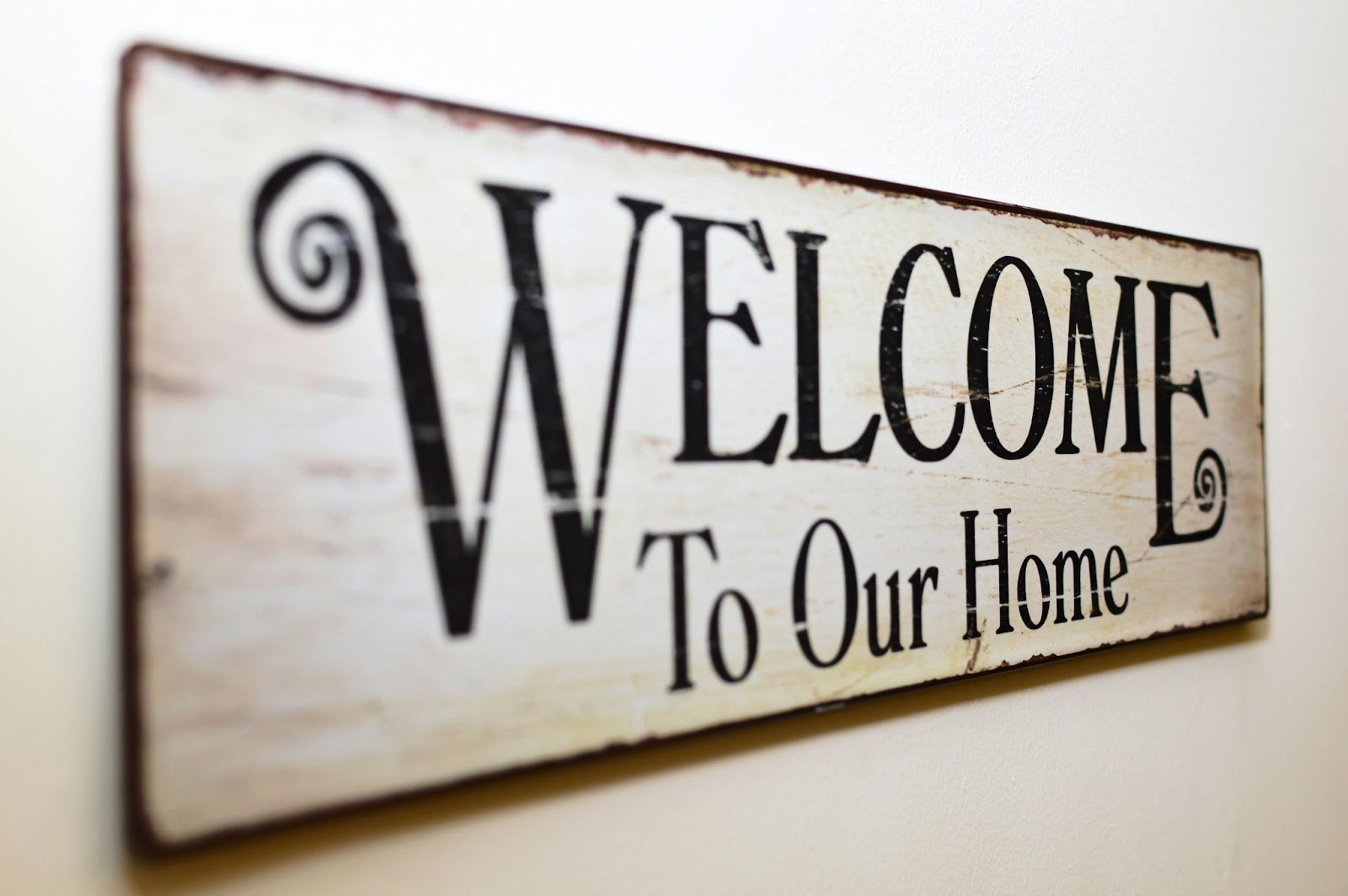 black and white welcome to our home sign