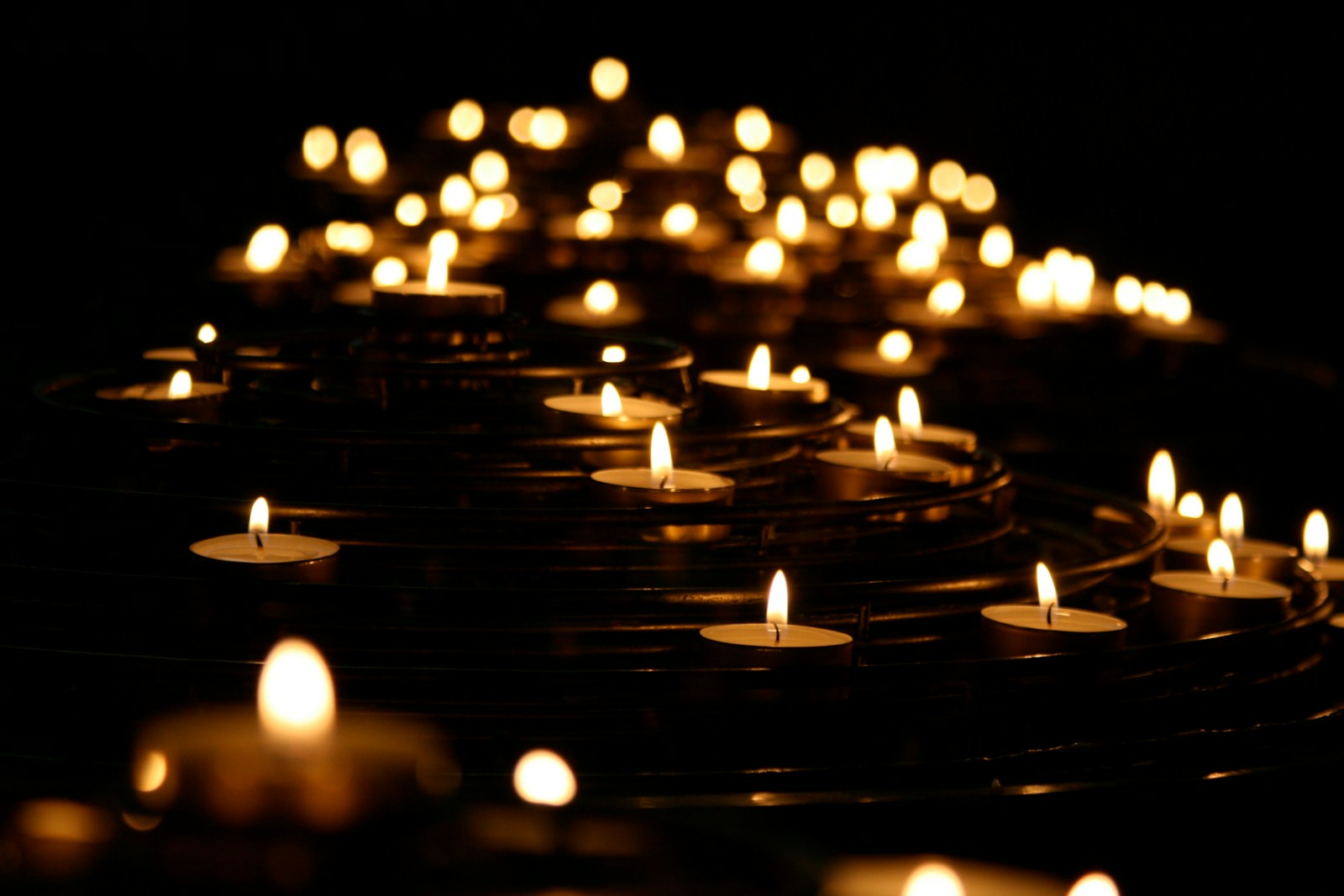 low-angle photo of lit candles
