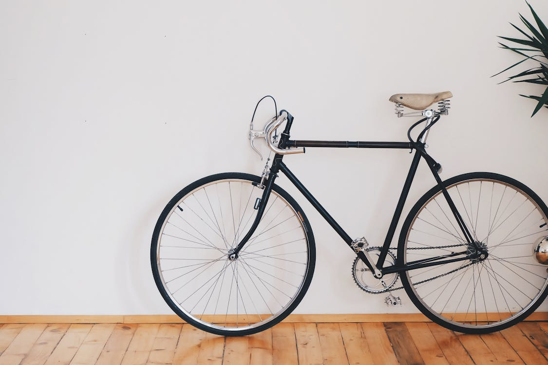 bike against white wall inside house