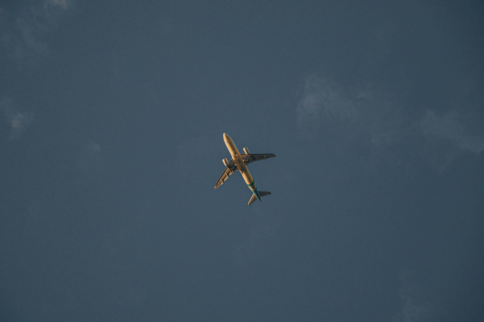 aeroplane in the sky from underneath