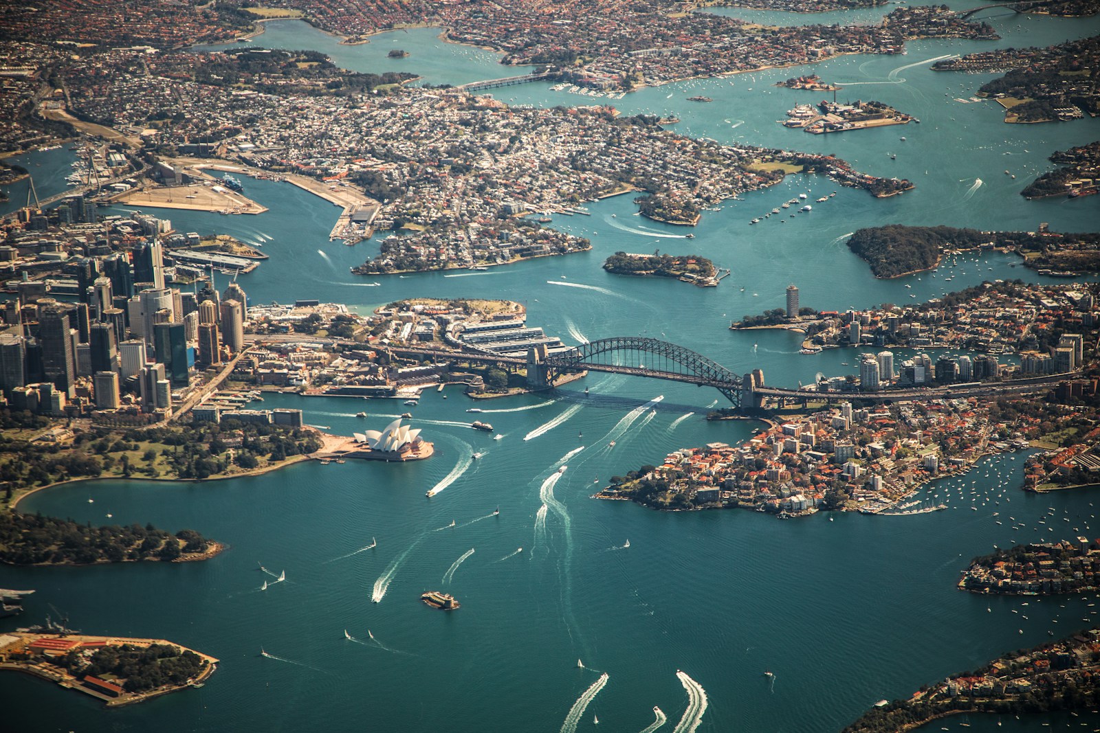 aerial photography of bridge, land and sea in Australia
