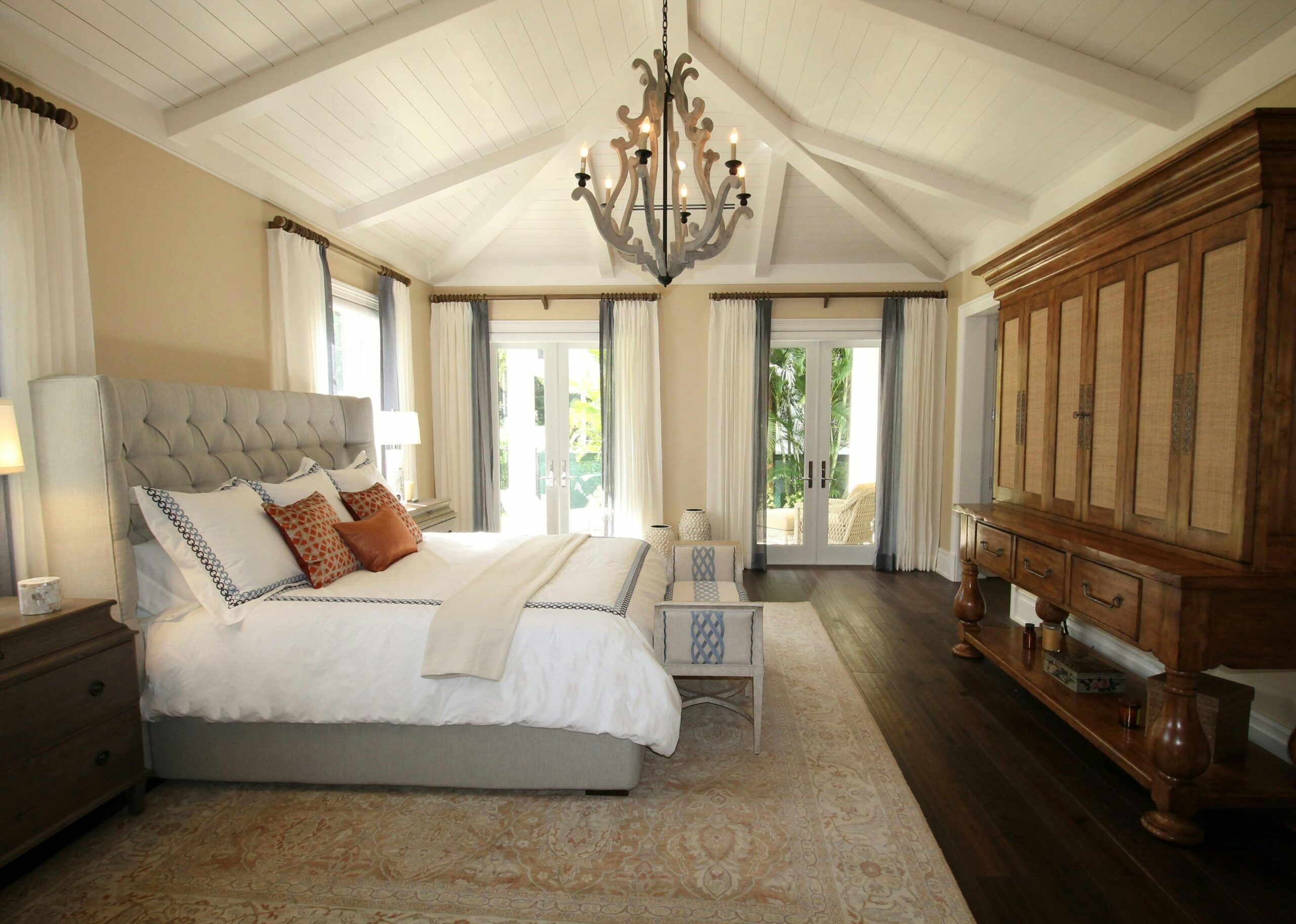 large bedroom with lots of windows