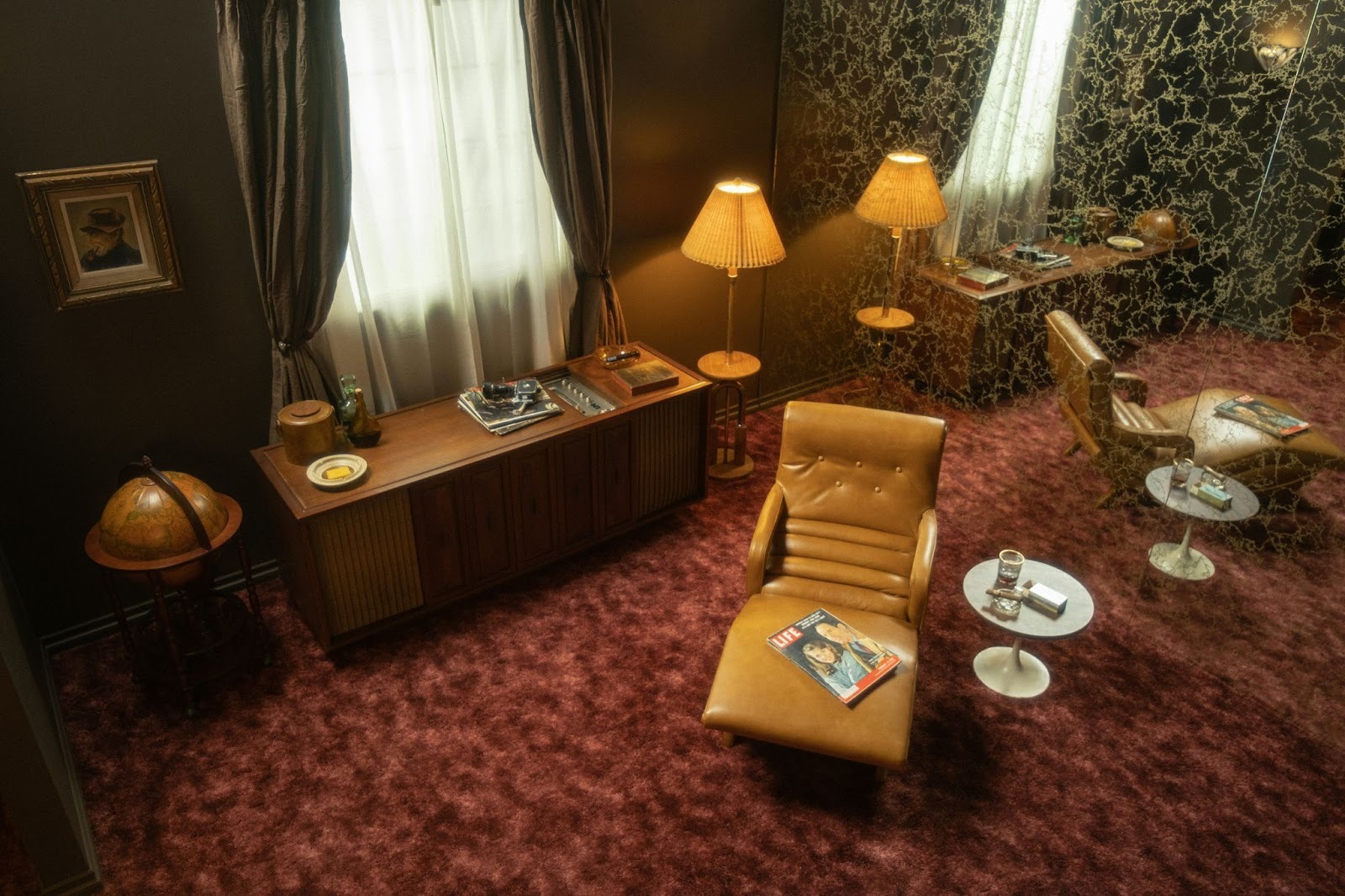 old style room from up high, with globe and mustard chair and table