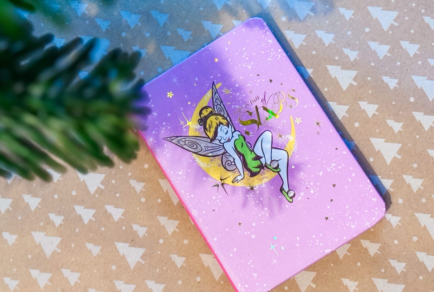 2026 disney Tinkerbell pink diary on wrapping paper with trees on