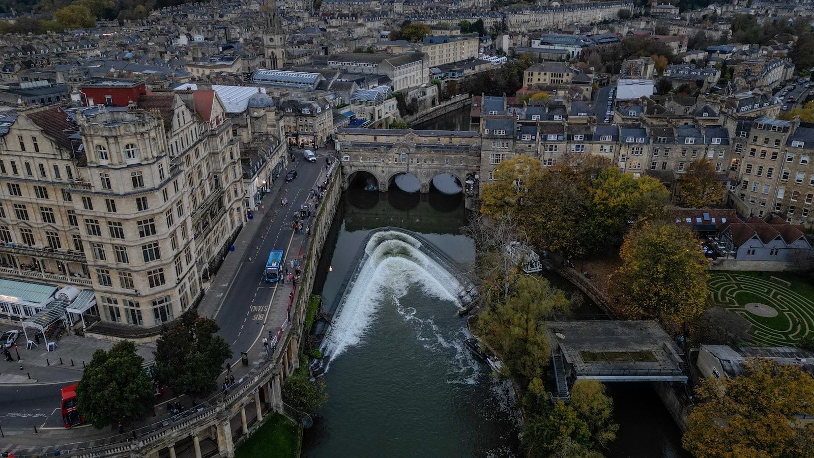 An aerial view of a river running through a city