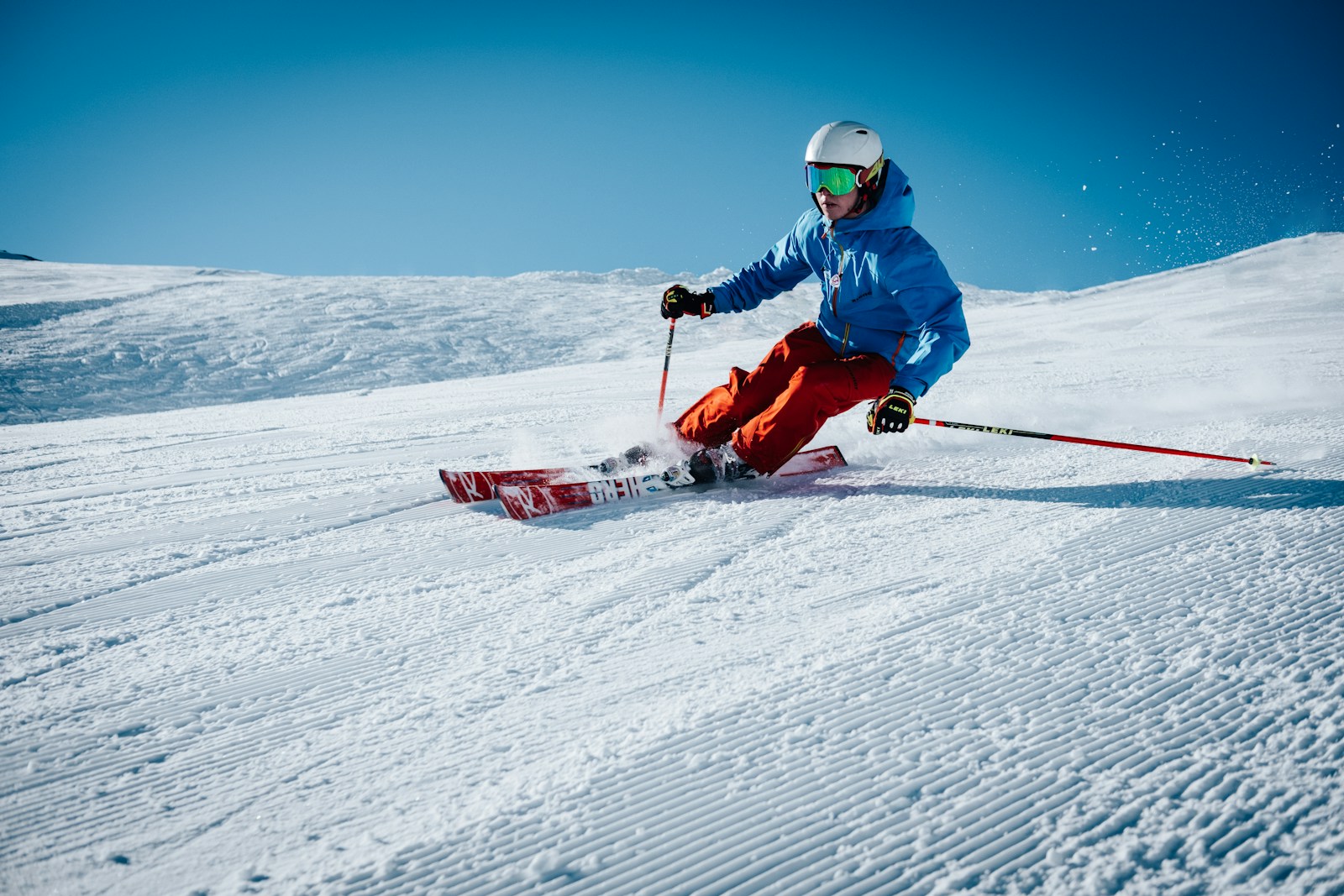 man skiing on hill covered in snow