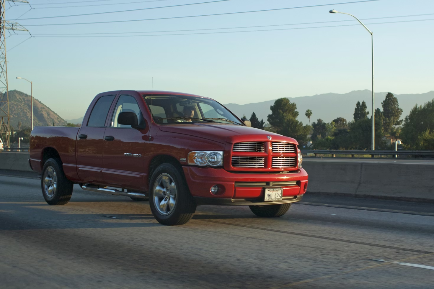 red pick-up truck on road