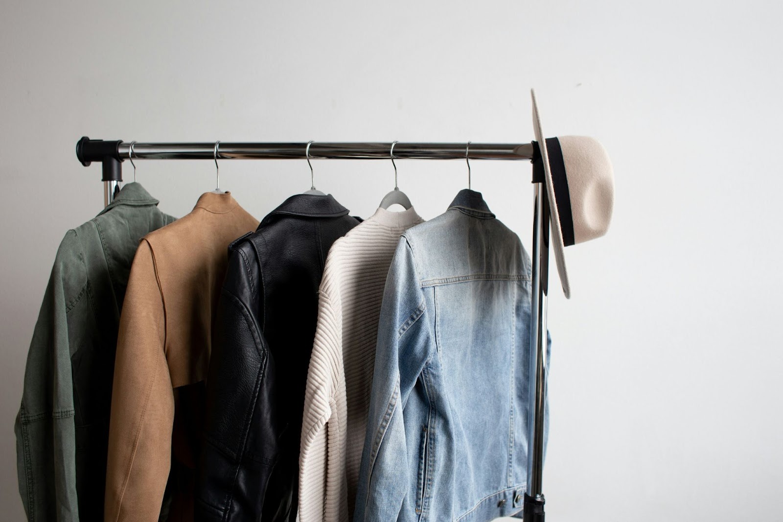 clothes hanging on rail