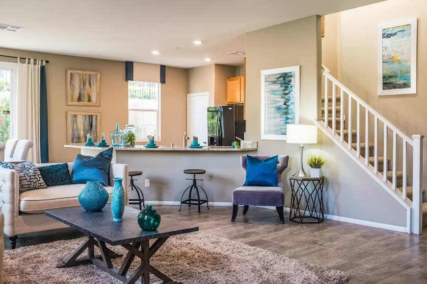 open living room with blue cushions