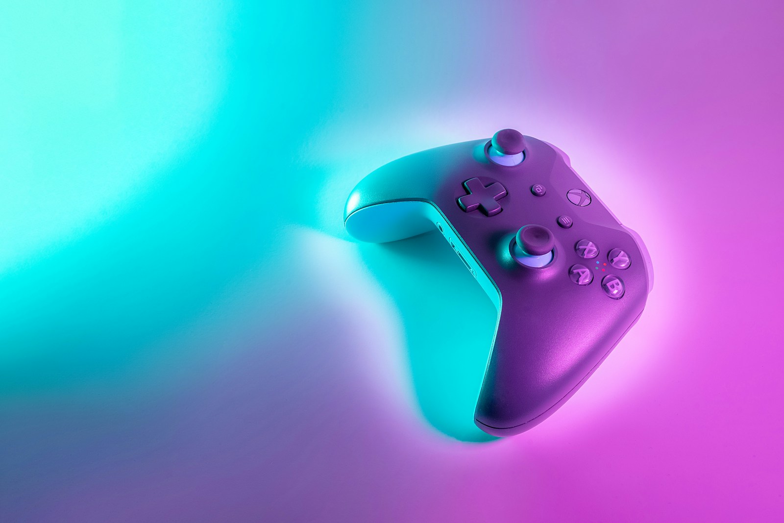 red xbox one game controller on surface