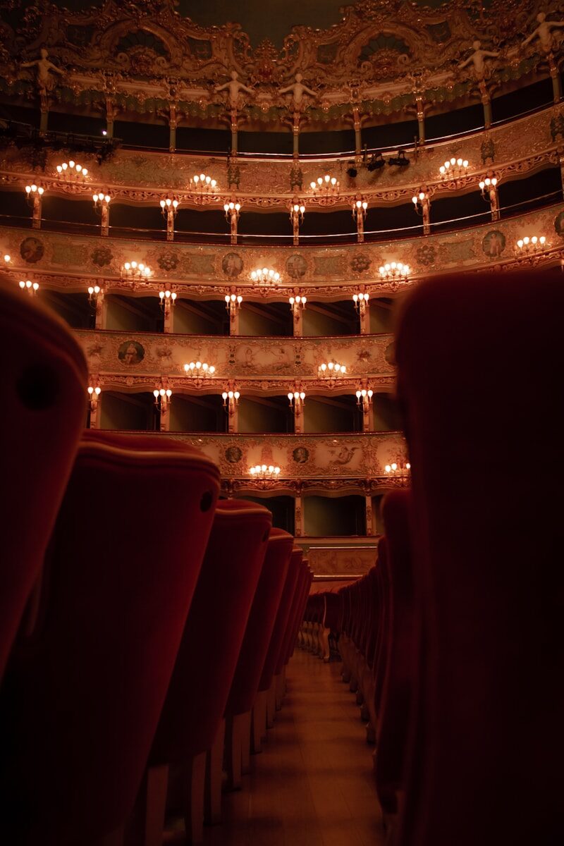 theatre with res seats in rows and lighting