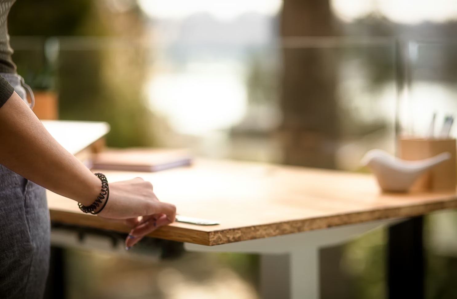 person standing at a desk