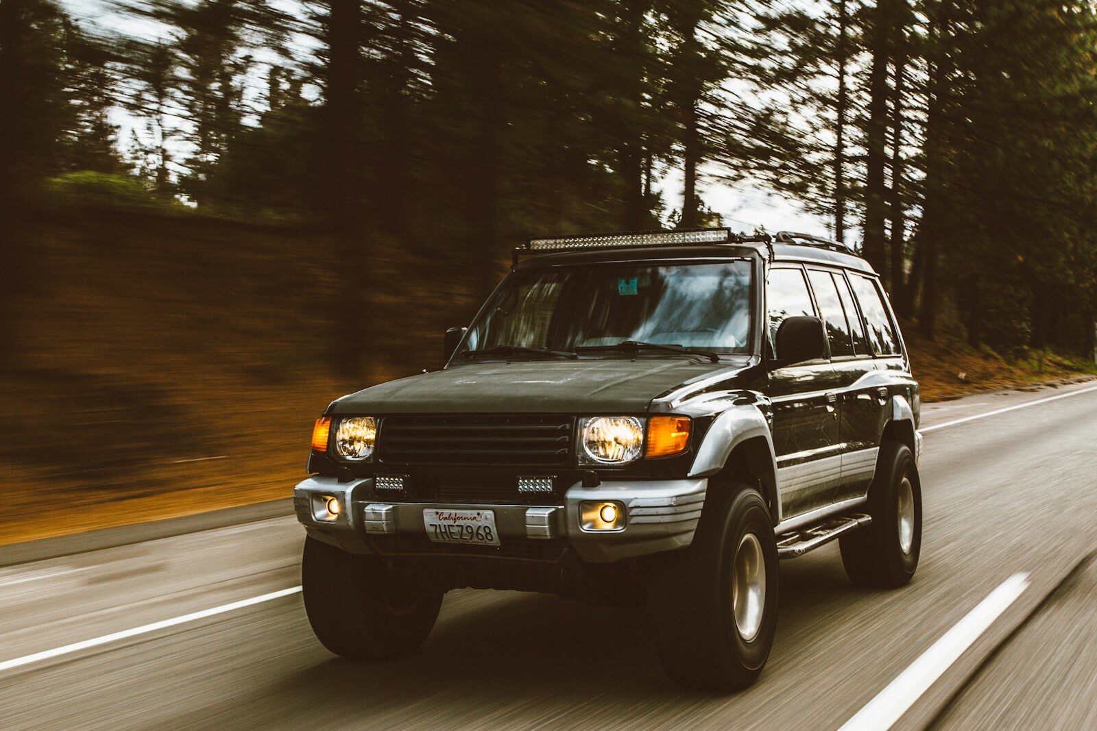 SUV car driving on road