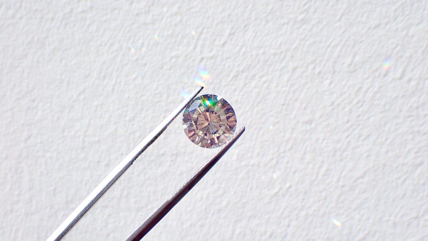 diamond between tweezers