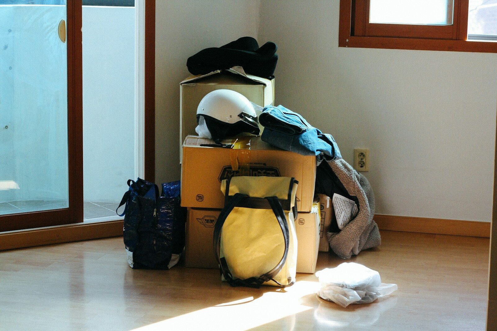 pile of things packed up on floor in house