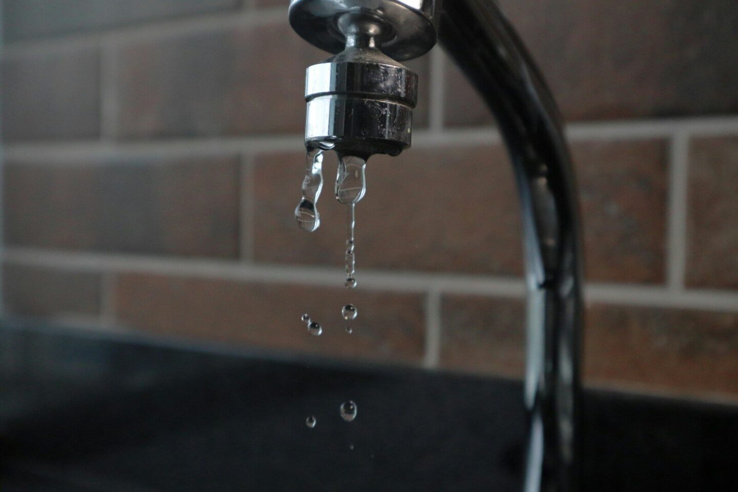a tap with water running from it's spout