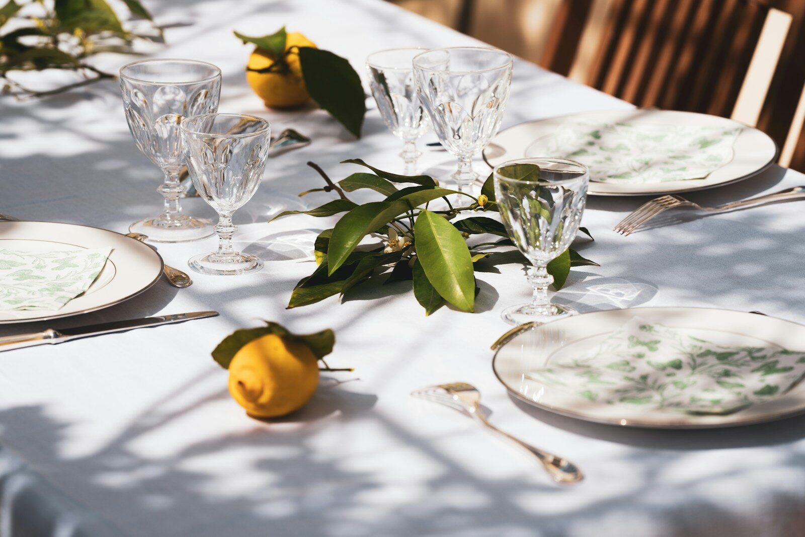 lemons on white table cloth on outside table