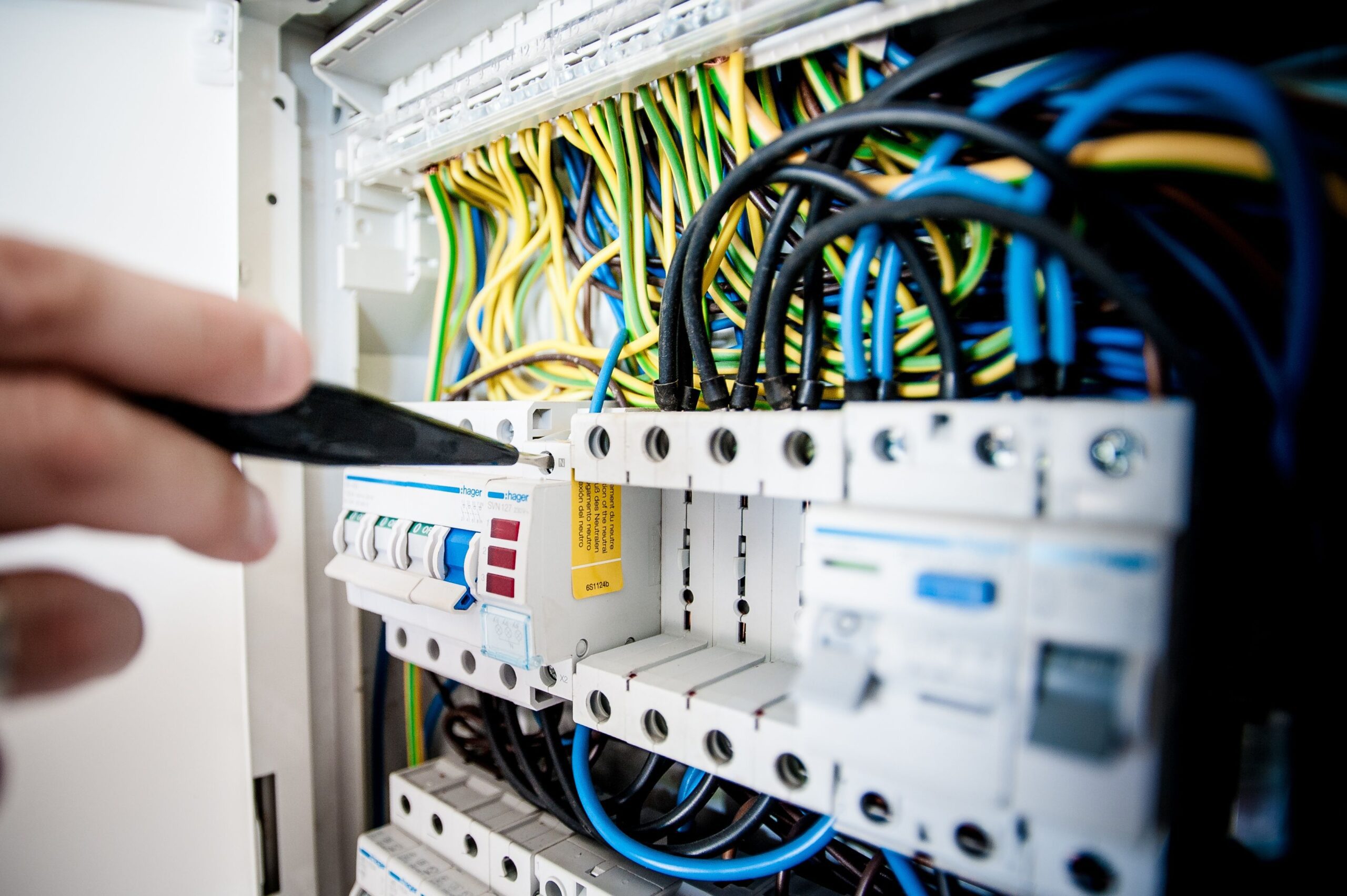 lots of coloured electrical wires in unit
