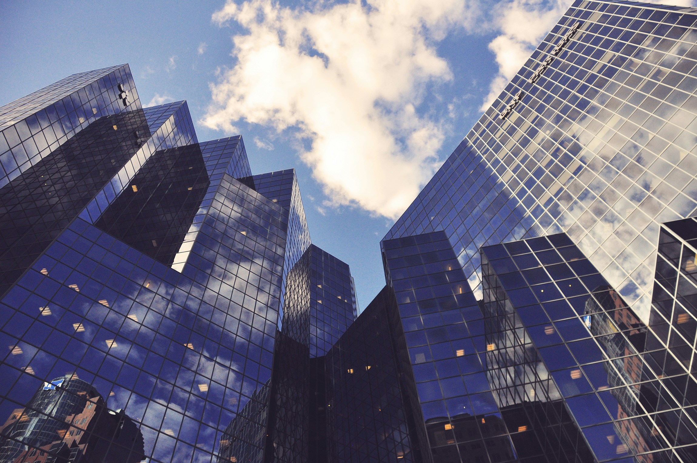 view of tall buildings from the ground up