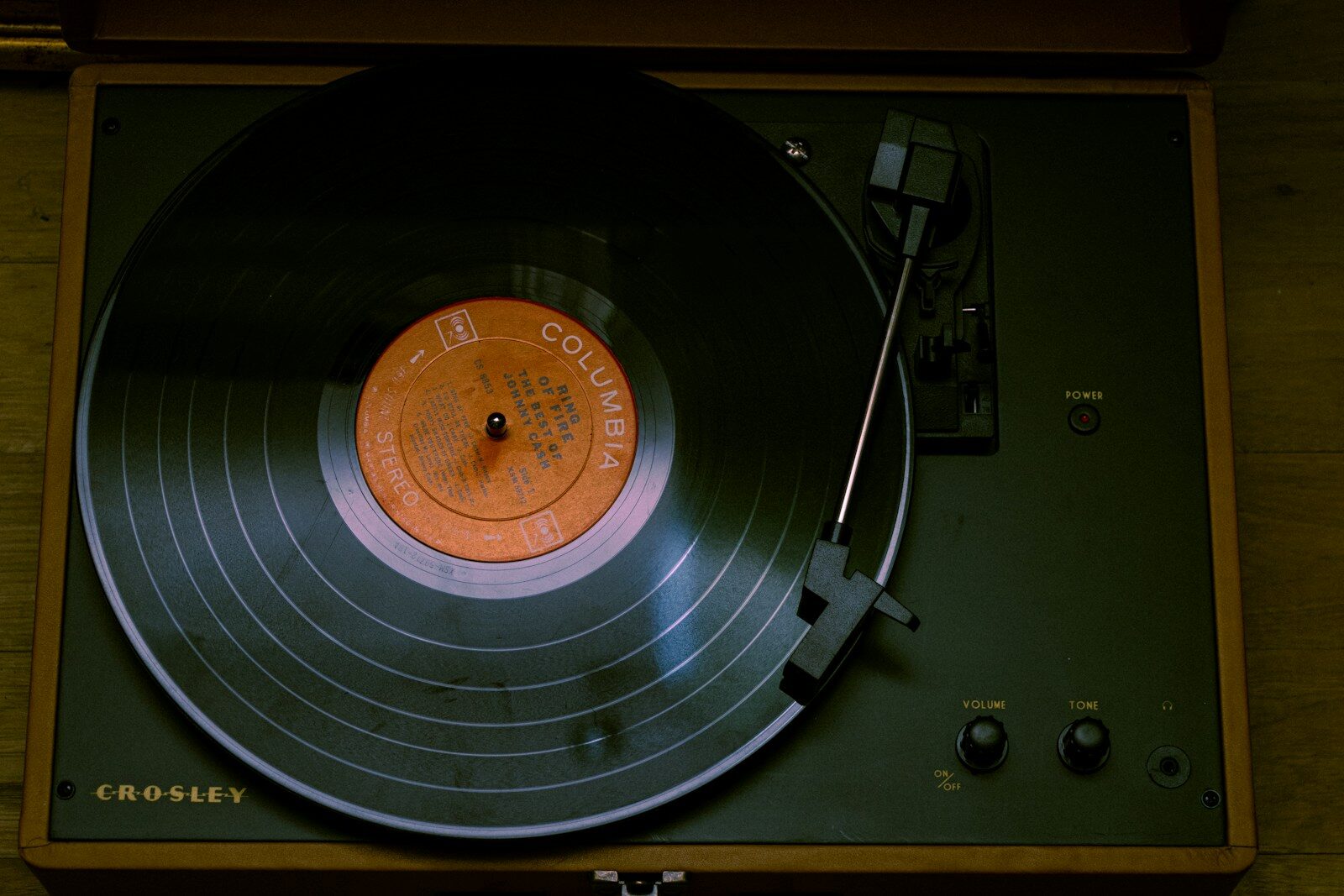 black and brown vinyl record player with record on it