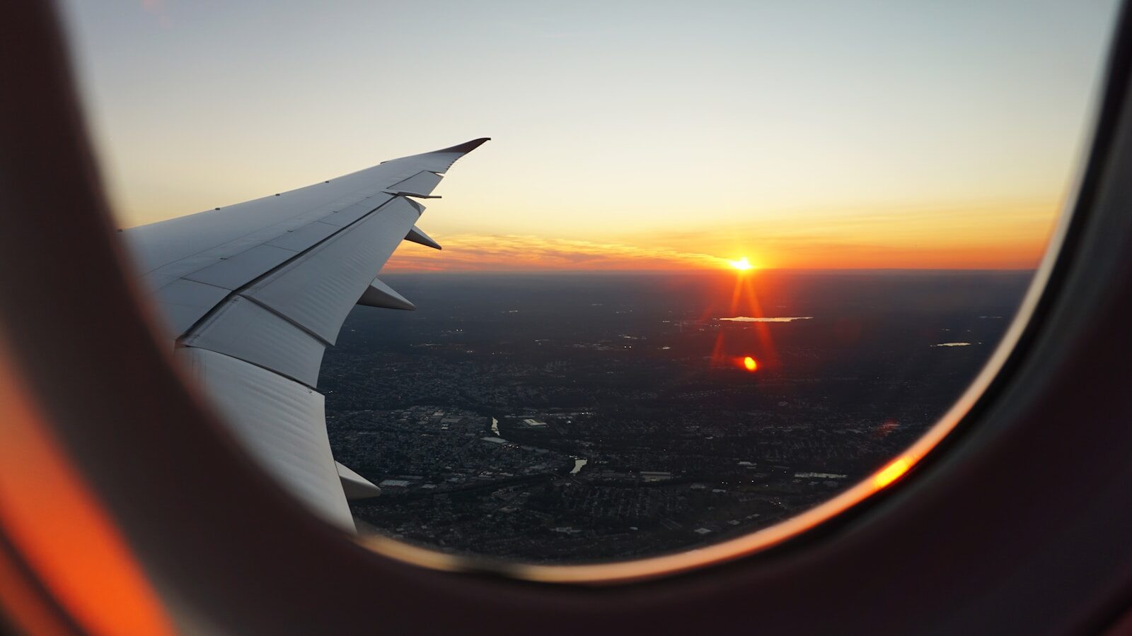 view out of aeroplane window during golden hour